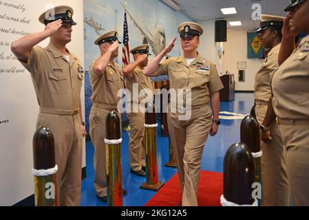 JACKSONVILLE, Fla. (Oct. 21, 2022) - Chief Navy Counselor Abbie Talley is piped aboard as a chief petty officer for the first time during a CPO pinning ceremony held at Naval Air Station Jacksonville, Oct. 21, 2022. Navy Region Southeast is the largest shore management region within the U.S. Navy, providing shore support for 18 installations across the southeastern United States. Stock Photo