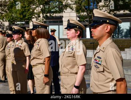 WASHINGTON (October 21, 2022) – Newly pinned chief petty officers stand at attention during a chief pinning ceremony hosted by Naval District Washington aboard the U.S. Navy Memorial. Twenty four Sailors from the National Capital Region were promoted to the rank of chief petty officer during the ceremony. Stock Photo