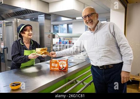 EDITORIAL USE ONLY Jonathan Warburton visits Mandy Harwood at Church Road Primary School in Bolton to hand deliver the Warburtons Foundation's one millionth donated product. Issue date: Monday November 21, 2022. Stock Photo