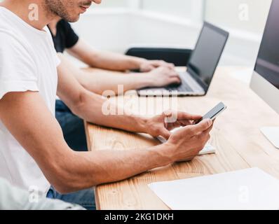 close up. employees work sitting at the office table. Stock Photo