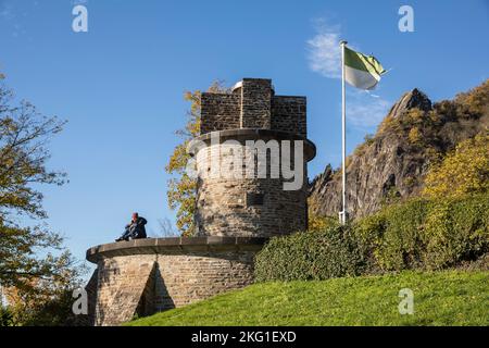 the Ulan monument in Rhoendorf on the river Rhine, in the background the Drachenfels hill near Koenigswinter, North Rhine-Westphalia, Germany. das Ula Stock Photo