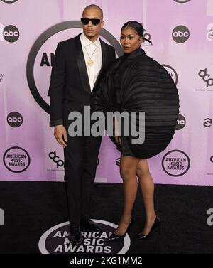 (L-R) Raysean Hairston And Muni Long Arrives At The 2022 American Music ...