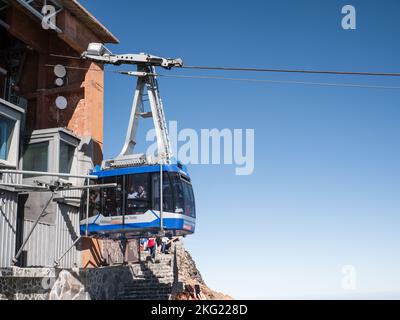 Tenerife, Spain, November 3rd 2022: Passengers inside the cableway of Teide National Park in Tenerife Stock Photo