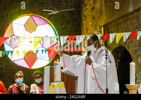 Sunday mass with baptisms in Karongi Genocide Memorial church, Kibuye, western Rwanda. Stock Photo