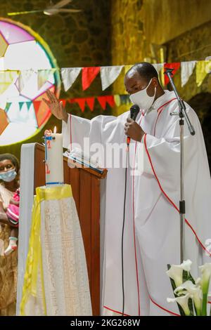 Sunday mass with baptisms in Karongi Genocide Memorial church, Kibuye, western Rwanda. Stock Photo