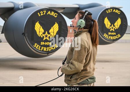 Tech. Sgt. Jessica Chatfield, a crew chief on the KC-135 Stratotanker from the 127th Air Refueling Group, Selfridge Air National Guard Base, Michigan, prepares the aircraft for a morning mission Oct. 25, 2022. The KC-135 is operated by the 127th Air Refueling Group, flown by the 171st Air Refueling Squadron and maintained by the 191st Maintenance Squadron. Crew chiefs play a vital role in keeping the KC-135s operational. Stock Photo