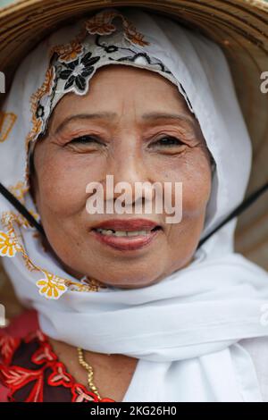Muslim woman wearing islamic veiled called  hijab.  Chau Doc. Vietnam. Stock Photo