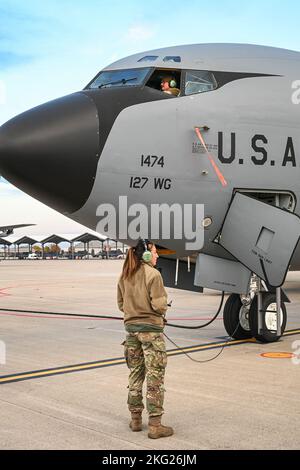 Tech. Sgt. Jessica Chatfield, a crew chief on the KC-135 Stratotanker from the 127th Air Refueling Group, Selfridge Air National Guard Base, Michigan, prepares the aircraft for a morning mission Oct. 25, 2022. The KC-135 is operated by the 127th Air Refueling Group, flown by the 171st Air Refueling Squadron and maintained by the 191st Maintenance Squadron. Crew chiefs play a vital role in keeping the KC-135s operational. Stock Photo