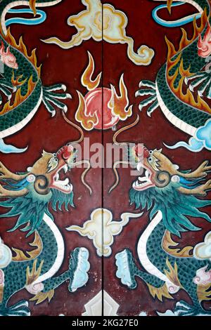 Drawings of dragons at the entrance to the 17th-century Chinese Quan Cong Temple. Hoi An. Hoi An. Vietnam. Stock Photo