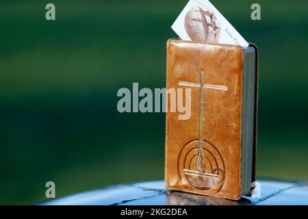 Old bible brown leather cover with cross. Stock Photo