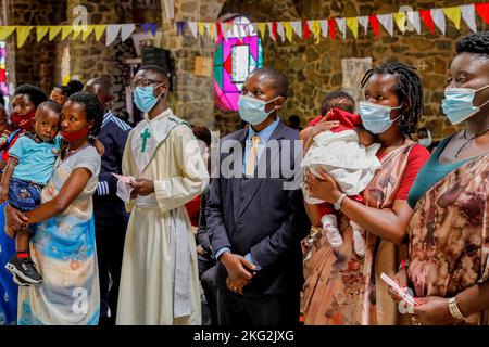 Sunday mass with baptisms in Karongi Genocide Memorial church, Kibuye, western Rwanda Stock Photo