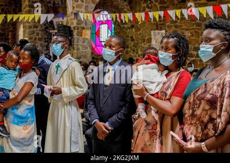 Sunday mass with baptisms in Karongi Genocide Memorial church, Kibuye, western Rwanda Stock Photo