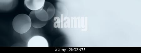 Blurred lights, gray, deep blue background, banner texture. Abstract bokeh with soft light header. Wide screen wallpaper. Panoramic web banner with co Stock Photo