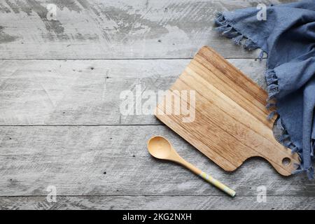 wooden chopping board on wooden background top down  Stock Photo