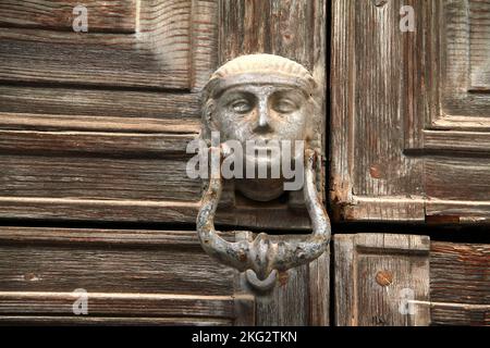 Beautiful door knocker in Italy Stock Photo