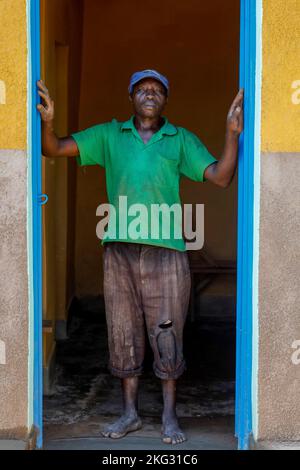 Member of Abakundakawa coffee grower's cooperative in his house in Gakenke district, Rwanda Stock Photo