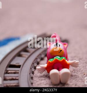 An Amy Rose toy model figure on a train track from the Sonic series Stock  Photo