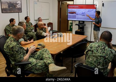 NG Chee Wee, left, ST Engineering, Rear Adm. Lorin Selby, center, chief ...