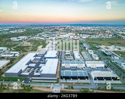 Aerial view of developed goods warehouse unit featuring highly maintained properties for working sector Stock Photo