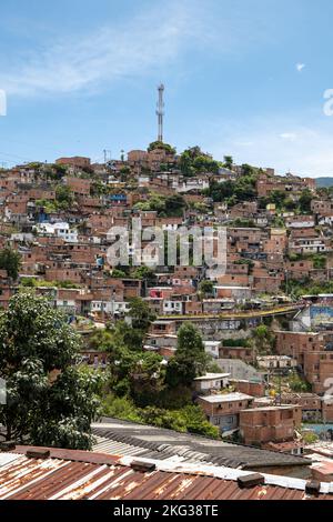 Medellin, Antioquia, Colombia - September 13 2022: Comuna 13 Touristic Artistic Urban Attraction Cultural Historical Neighborhood in a Cloudy Day Stock Photo