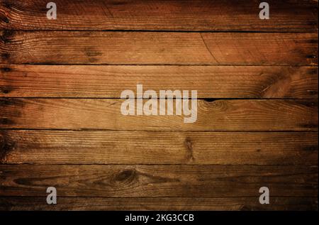 Weathered dark wooden planks background with nails Stock Photo