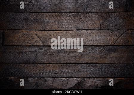 Dark stained wooden texture background Stock Photo