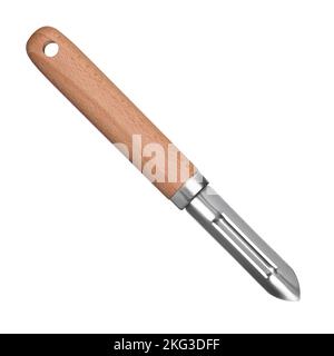 Vegetable peeler isolated on white background. New clean potato peeler with wooden handle. Stock Photo