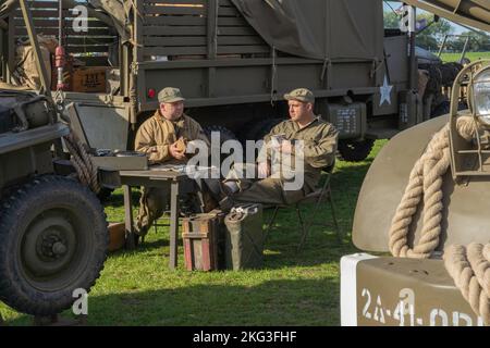 Mock up army mess with people in army clothing and setting the scene as it would have been at the time in the second world war. Stock Photo