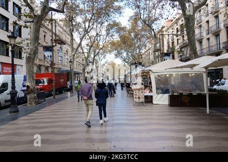 Tourists walking along La Rambla, Barcelona Stock Photo