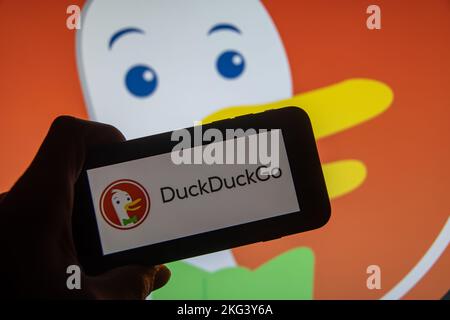 Rheinbach, Germany  21 November 2022,  The brand logo of the Internet search engine 'DuckDuckgo' on the display of a smartphone Stock Photo
