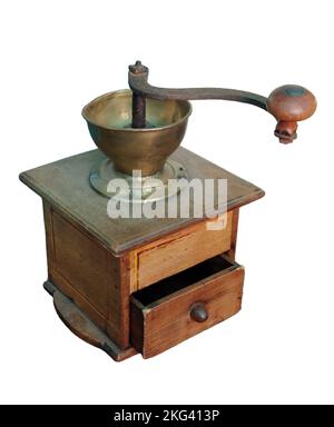 Old wooden manual coffee grinder for grinding coffee beans. Stock Photo
