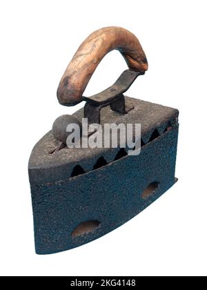 Old rusty charcoal iron with wooden handle isolated on white Stock Photo