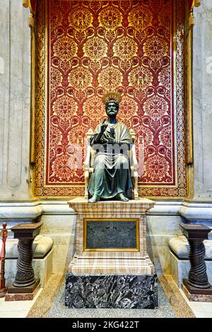 Rome Lazio Italy. Saint Peter's Basilica in Saint Peter's Square. The bronze statue of Saint Peter holding the keys of heaven by Arnolfo di Cambio Stock Photo