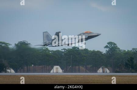 A 325th Fighter Wing F-22A Raptor takes off for a mission Oct. 28 at Eglin Air Force Base, Fla.  A squadron of the wing’s Raptors have been at Eglin since Hurricane Michael devastated Tyndall Air Force Base in 2018. Stock Photo