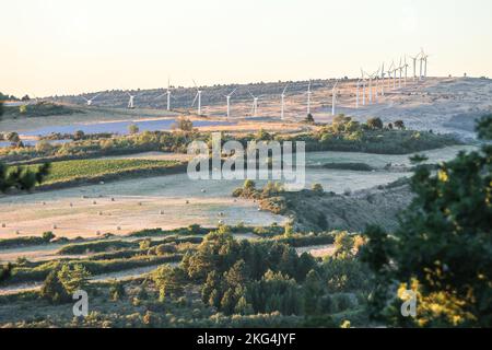 Wind turbine,wind turbines,View,views,viewpoint,from,summit,of,Mont Sec,above,village,of,Montazels,Aude,Occitanie,South of France,France,French,Europe,European,August,summer Stock Photo