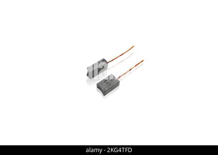 Old carbon brush of automotive generator , object isolated with clipping path on white background Stock Photo