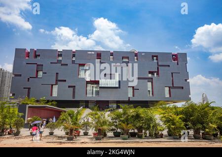 Looking like a massive cube puzzel, the Guangdong Museum sits next to the Guangzhou Opera House in Guangzhou, Guangdong province, People's Republic of Stock Photo