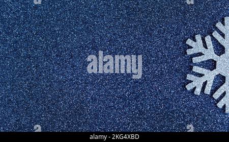Large blue snowflakes on a blue background. Stylish Christmas concept. Stock Photo