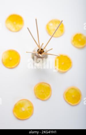 Citrus reed diffuser home on white background Stock Photo