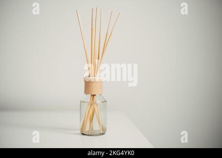 Reed air freshener on table in room home Stock Photo