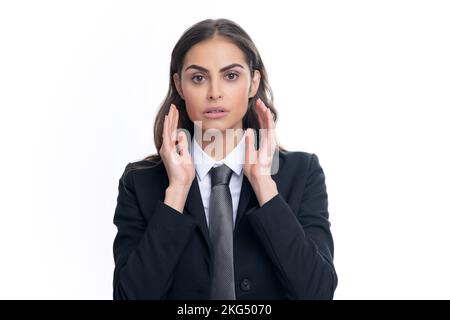 Portrait of young woman feeling stress or strain headache. Female employee young secretary. Upset sad depressed model with hands on head. Stock Photo