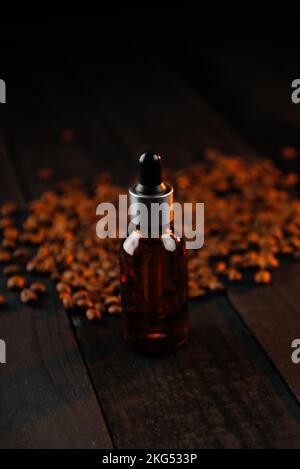 Men's efir oil for beard with coffee aroma. Stock Photo