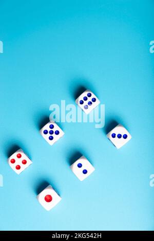 White bones on the background. Game devices. Copy space for text. The concept of a game of chance Stock Photo