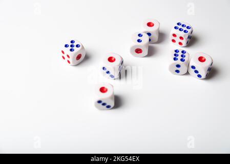 Dice with numbers on a white background. Accident Stock Photo