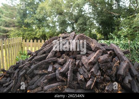 A large pile of sod excavated from a bog in the Irish countryside Stock Photo