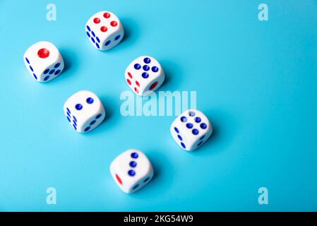 cubes with numbers on blue background. dice Stock Photo