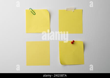 Yellow sticky memo notes with copy space on white background Stock Photo