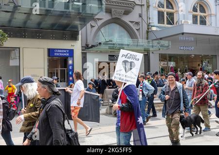 Anti covid 19 policy protestors march along Bourke street in Melbourne city centre,Victoria,Australia Stock Photo