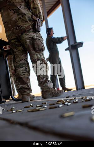 Col. Isaac T. Bell, 366th Fighter Wing Deputy commander, fires a Berretta M9 pistol at the off-base shooting range on Oct. 5, 2022 outside of Mountain Home Air Force Base, Idaho. Weapons qualification on specific weapons are a requirement for Air Force members prior to deploying. Stock Photo