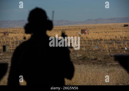 Col. Isaac T. Bell, 366th Fighter Wing Deputy commander, fires a M320 grenade launcher at the off-base shooting range on Oct. 5, 2022 outside of Mountain Home Air Force Base, Idaho. Col. Bell had the chance to fire numerous weapons. Stock Photo